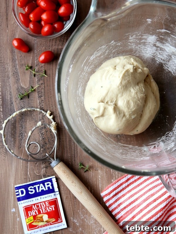 Roasted Tomato Focaccia with Garlic and Rosemary 3 Roasted Tomato Focaccia Bread | completelydelicious.com