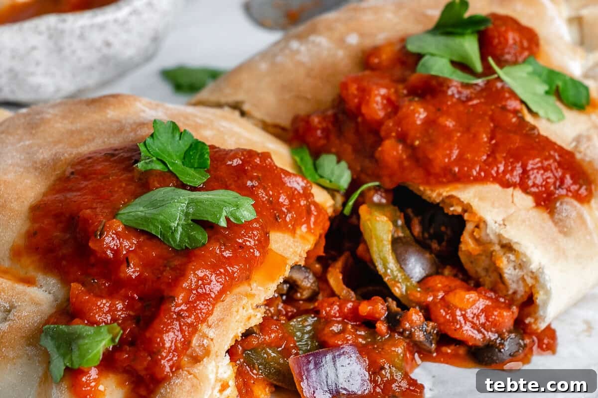 Vegan Calzones with Homemade Vegan Pizza Dough 15 completed Marinara Calzone split open in the middle