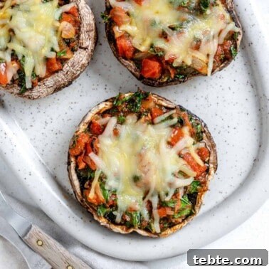Vegan Calzones with Homemade Vegan Pizza Dough 19 completed Portobello Mushroom Pizzas in a white serving tray