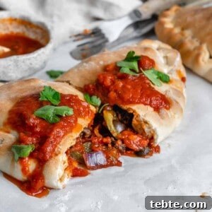 Vegan Calzones with Homemade Vegan Pizza Dough 20 completed Marinara Calzone split open in the middle
