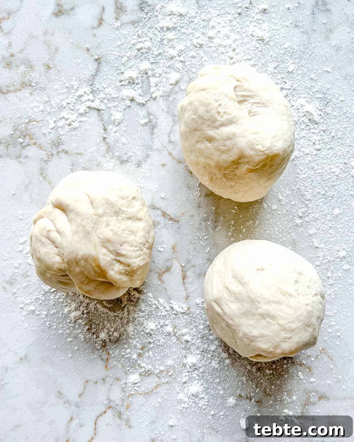 Vegan Calzones with Homemade Vegan Pizza Dough 8 three balls of dough against white surface