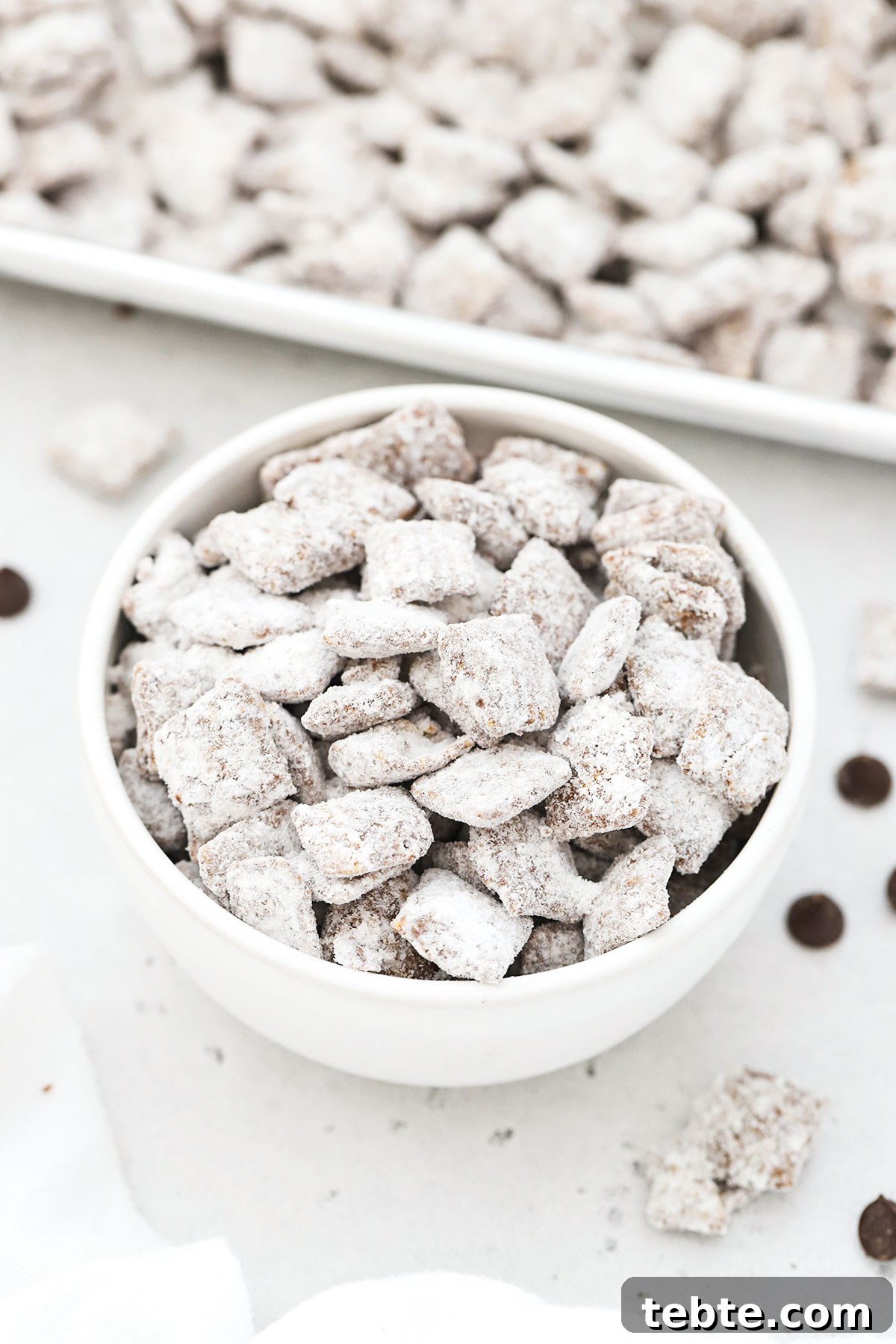 Gluten-Free Muddy Buddies Puppy Chow Recipe 6 gluten free puppy chow in a white bowl